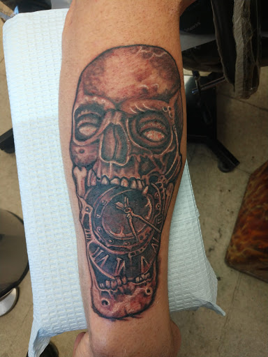 Explore middle arm tattoo ideas, creative tattoo ideas in Sycamore, available at Spider Tattooz 2