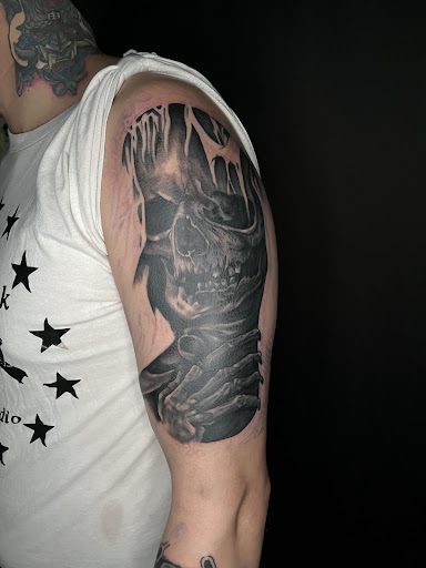 Explore portrait tattoo ideas, creative tattoo ideas in Cadillac, available at Limitless Ink Tattoo Studio