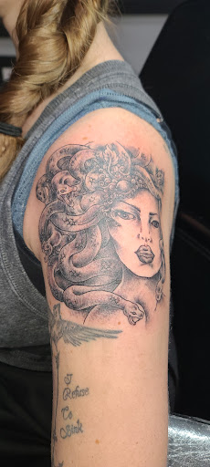 Explore boyfriend name tattoos ideas, creative tattoo ideas in Walworth, available at Bearded Buffalo Tattoo and Body Piercing