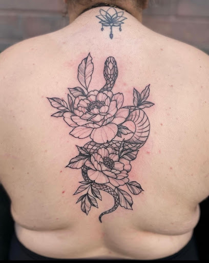 Explore pretty flower tattoo ideas, creative tattoo ideas in Peoria, available at Modern Ink Tattoo