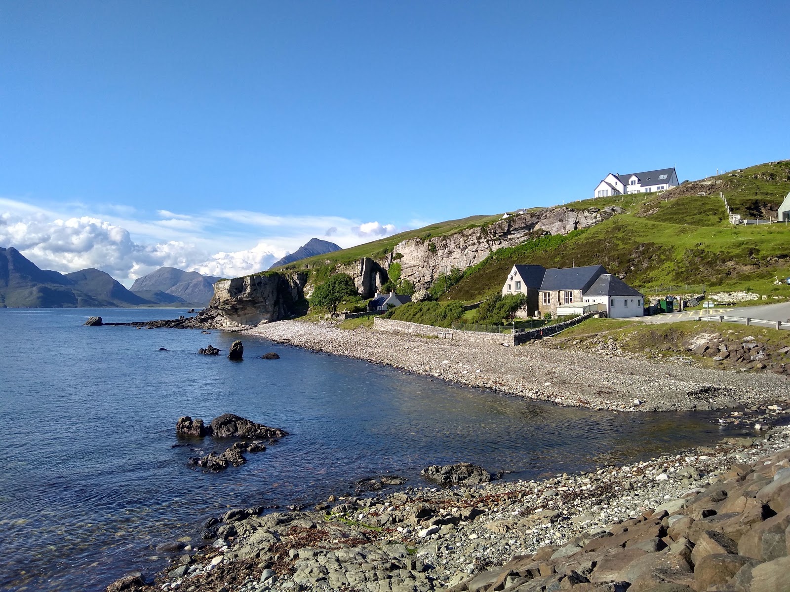Photo of Elgol Beach with gray sand &  rocks surface
