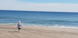 Foto di Matata Beach con costa lunga e dritta