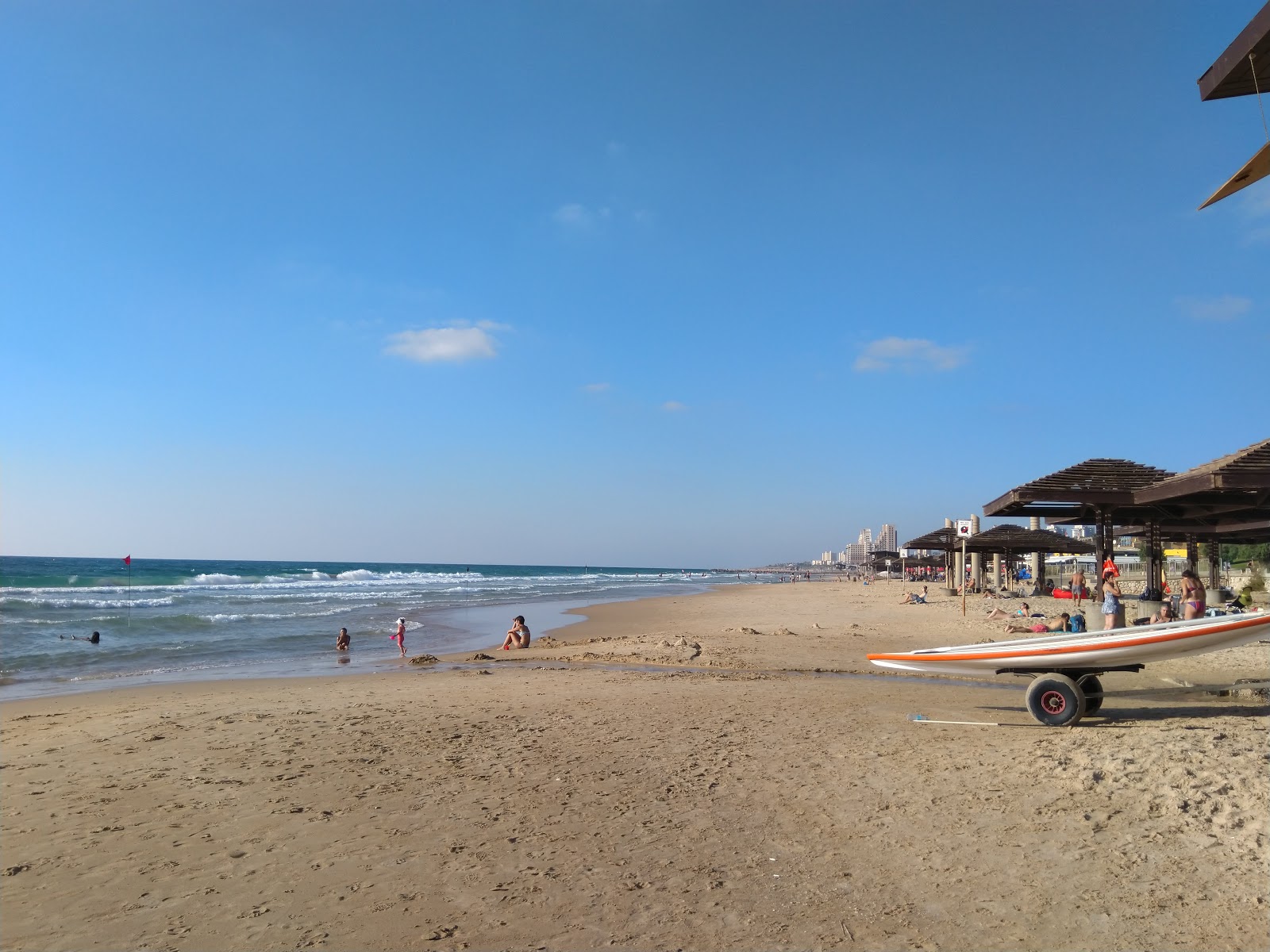 Photo of Hof HaCarmel with turquoise water surface