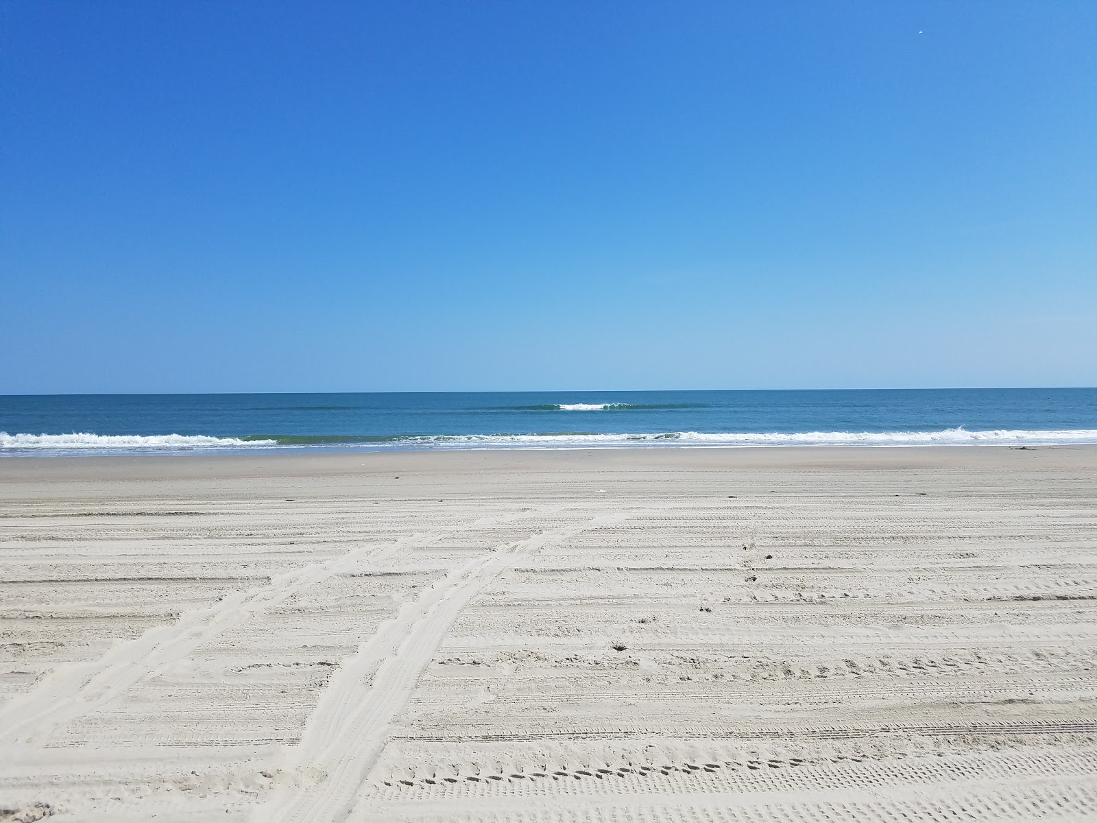 Foto av Corolla beach med hög nivå av renlighet