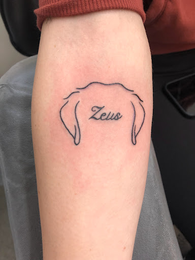 Explore cover up tattoo ideas for names, creative tattoo ideas in Adrian, available at Ambition Ink