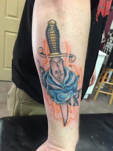 Explore mens arm sleeve tattoo ideas, creative tattoo ideas in Anniston, available at Wicked Game Tattoo & Piercing Studio