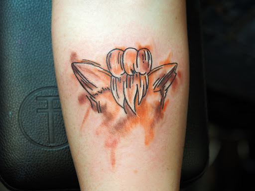 Explore men shoulder tattoo ideas, creative tattoo ideas in Springfield, available at Poke and a Rub art studio