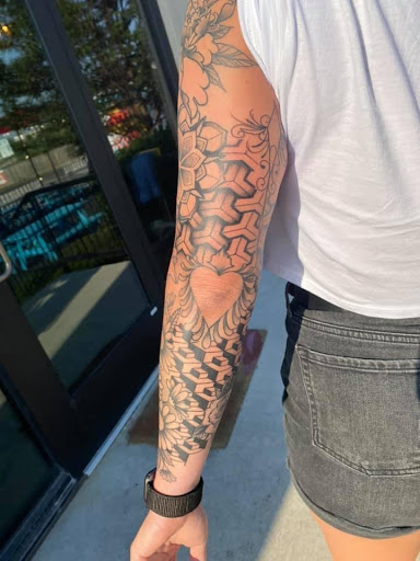 Explore tomahawk tattoo ideas, creative tattoo ideas in Aledo, available at Elevated Tattoo & Piercing
