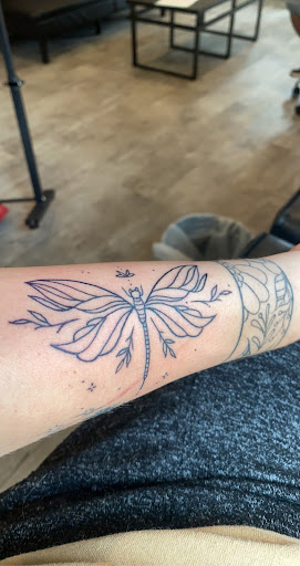 Explore small red tattoos ideas, creative tattoo ideas in Stevens Point, available at Against All Odds Tattoo