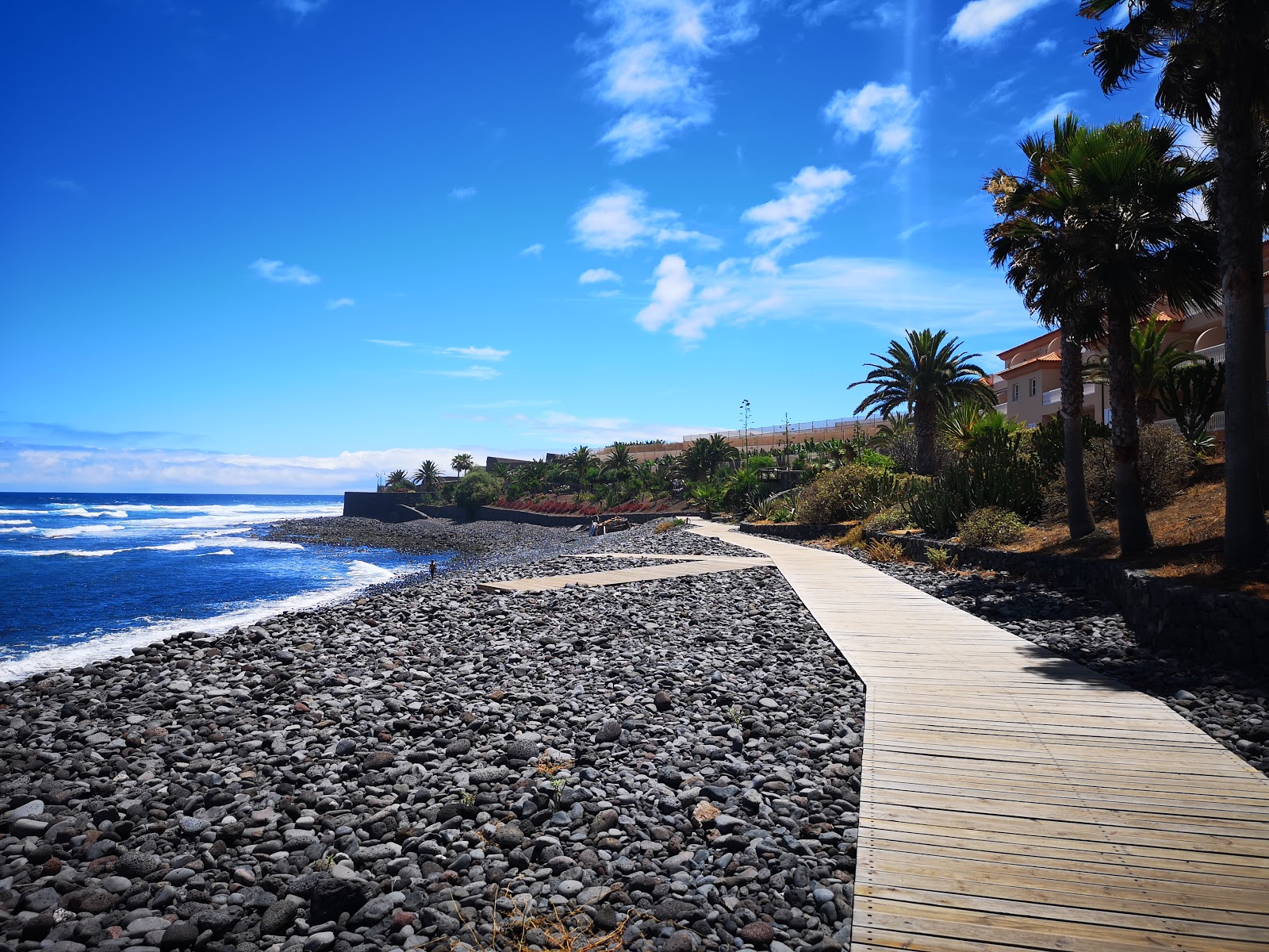 Photo de Playa de la Caleta avec l'eau cristalline de surface