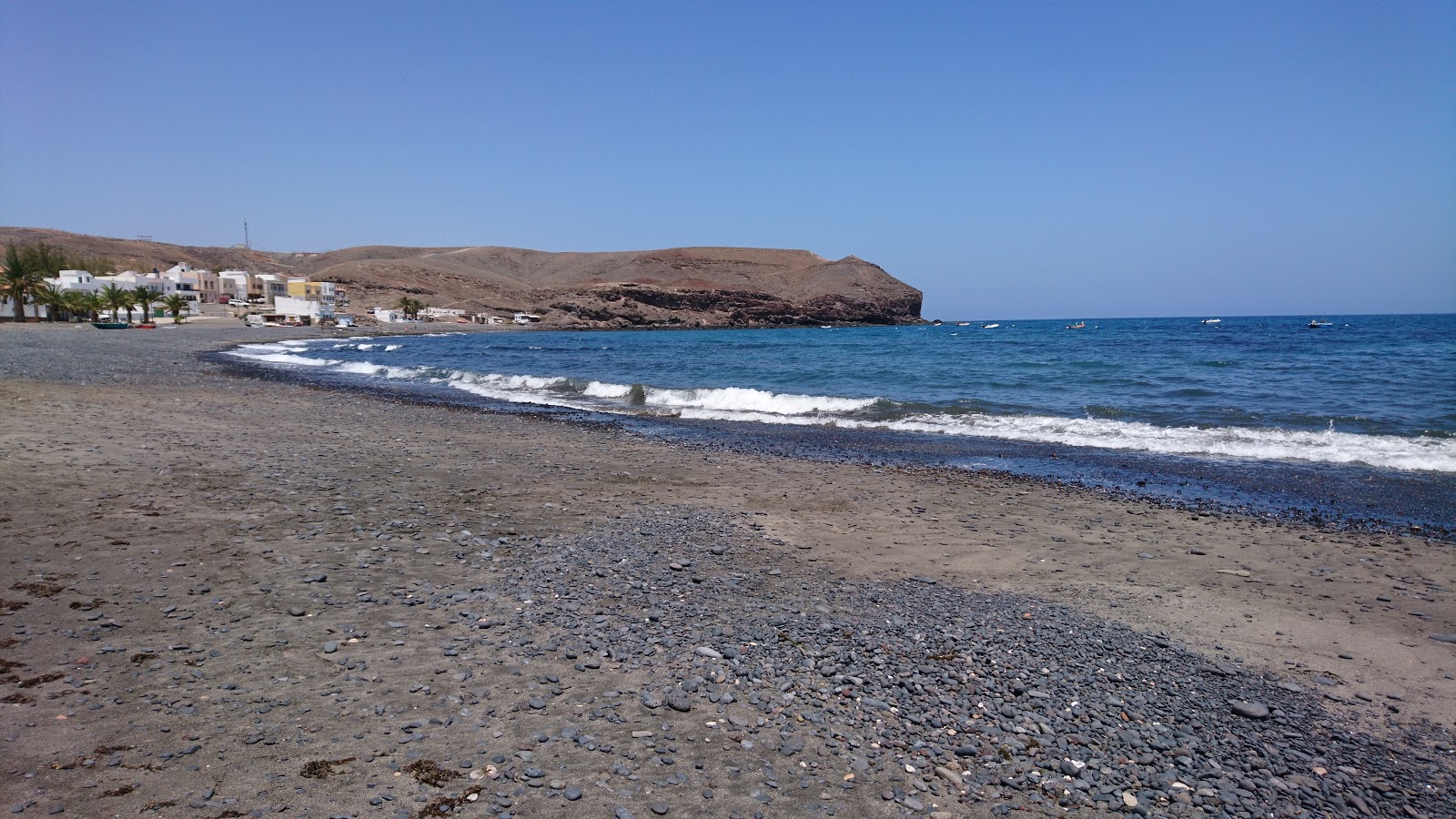 Photo de Playa la Lajita avec l'eau cristalline de surface