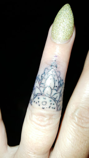 Tattoo Shop «Matryoshka Tattoo», reviews and photos, 902 N Kansas Ave, Topeka, KS 66608, USA