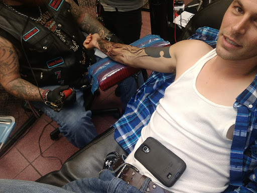 Find playboy bunny tattoo ideas for your next unique tattoo in Longview at Fugis Tattoo Shop