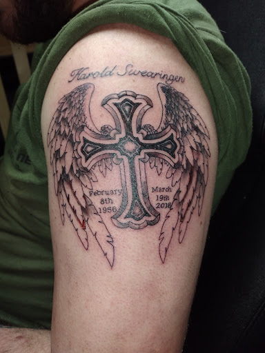 Explore men's side neck tattoo ideas, creative tattoo ideas in Kewanee, available at Splat Ink tattoos and piercings