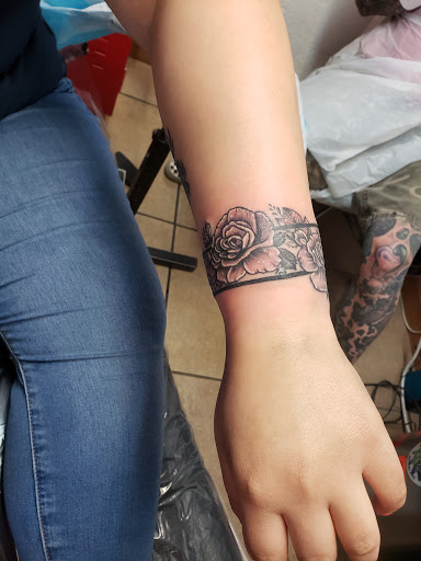 Explore tattoo for husband ideas, creative tattoo ideas in Elko, available at Tom Custom Tattoos and Body Piercing Studio