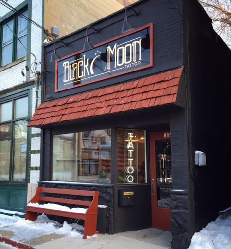 Explore kiss lip tattoo ideas, creative tattoo ideas in Madison, available at Black Moon Tattoo