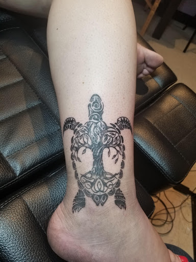 Explore grumpy bear tattoo ideas, creative tattoo ideas in Shelby, available at T&C Tattoo Studios