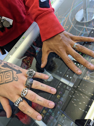 Explore red bird tattoo ideas, creative tattoo ideas in Redding, available at Caddy Daddys