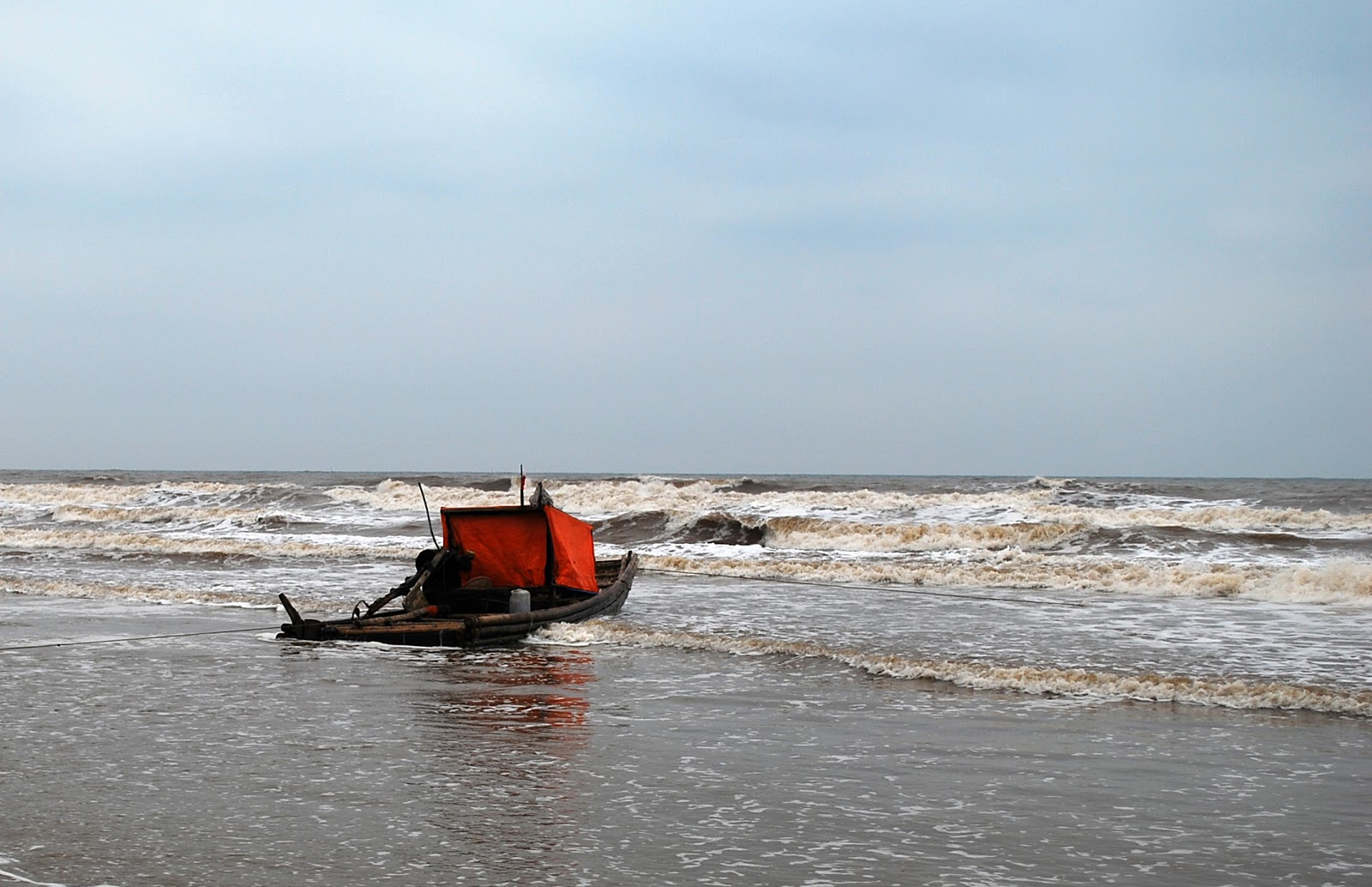 Foto de Hai Thanh Beach com baixo nível de limpeza