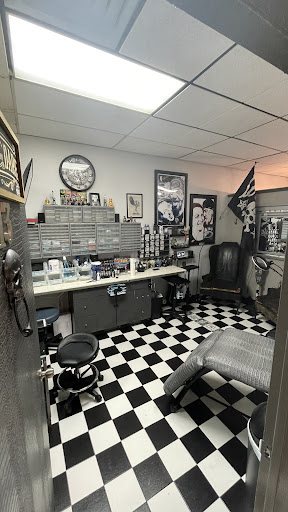 Explore red hand tattoo ideas, creative tattoo ideas in Lanoka Harbor, available at Fine Lines Body Art Studio