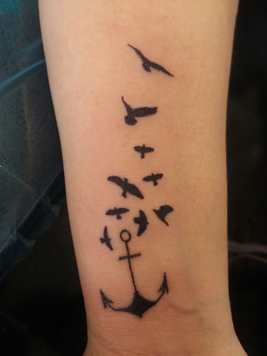 Explore dark tattoo ideas for men, creative tattoo ideas in Nevada, available at Generation X Tattoos and Piercings