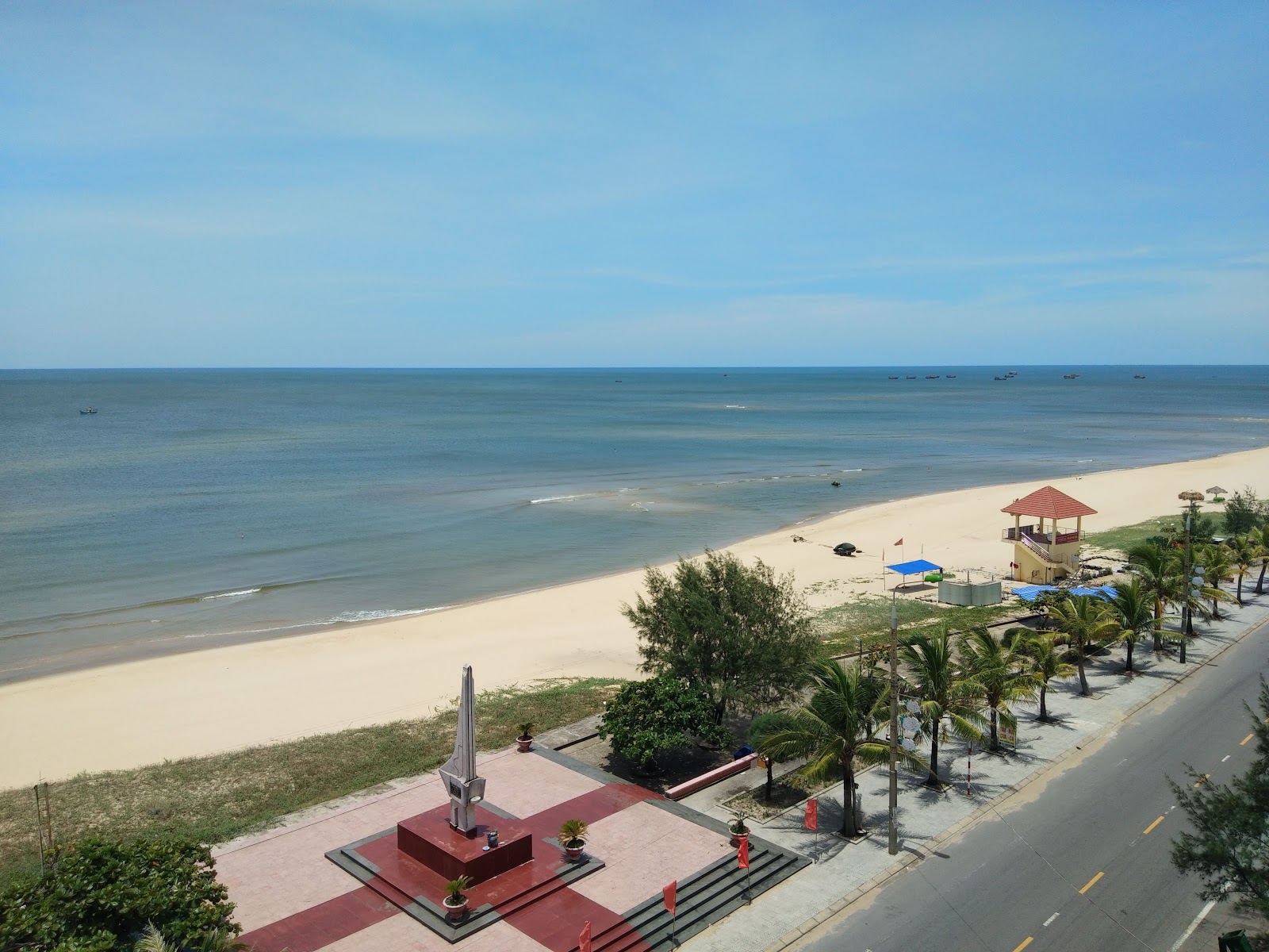 Photo of Nhat Le Beach with bright sand surface