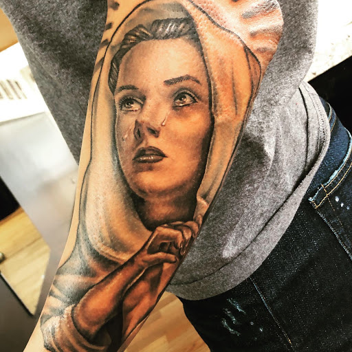 Explore tattoo ideas for spine, creative tattoo ideas in Sarasota, available at SEVEN SINS Tattoo Studio