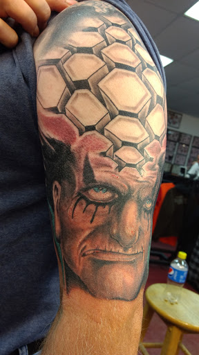 Explore mens small tattoo ideas, creative tattoo ideas in Burlington, available at Tiny Tims Tattoo Shop