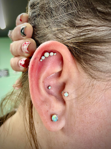 Explore men's arm sleeve tattoo ideas, creative tattoo ideas in Twin Falls, available at Pinpoint Body Piercing