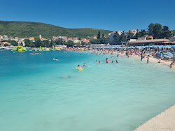 Foto di Spiaggia di Poli Mora e l'insediamento