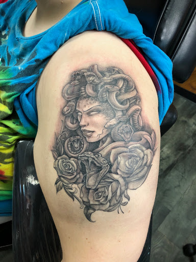 Explore mc escher tattoo ideas, creative tattoo ideas in Des Moines, available at Skin Kitchen Tattoo