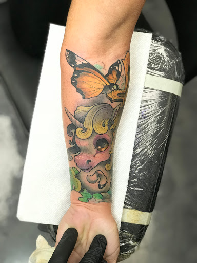 Explore color tattoo ideas, creative tattoo ideas in Tallmadge, available at Killjoy tattoo