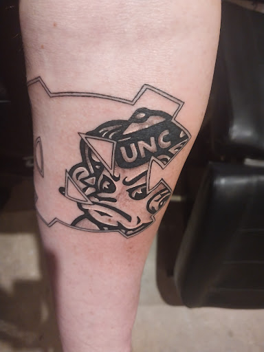 Explore logger tattoo ideas, creative tattoo ideas in Charlottesville, available at Tatted Souls LLC