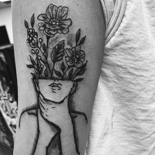 Explore lower belly tattoo ideas, creative tattoo ideas in Seymour, available at American Gypsy Tattoo Corp.