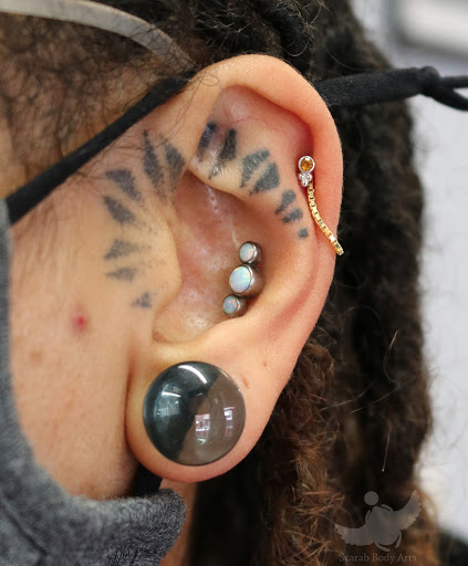 Find tattoo ideas for gay couples for your next unique tattoo in Syracuse at Scarab Body Arts