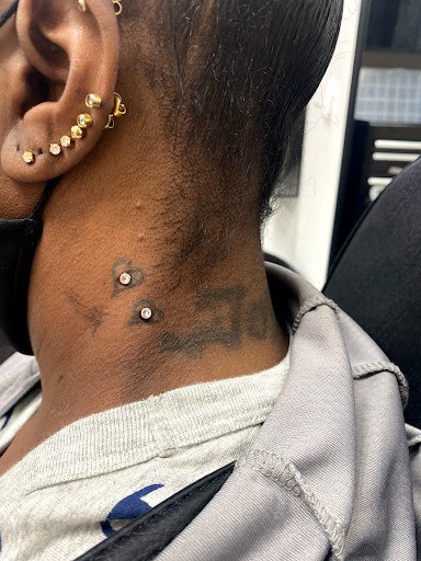 Explore side stomach tattoo ideas, creative tattoo ideas in Milwaukee, available at Piercing by Dani Real Ink Tattoo Studio