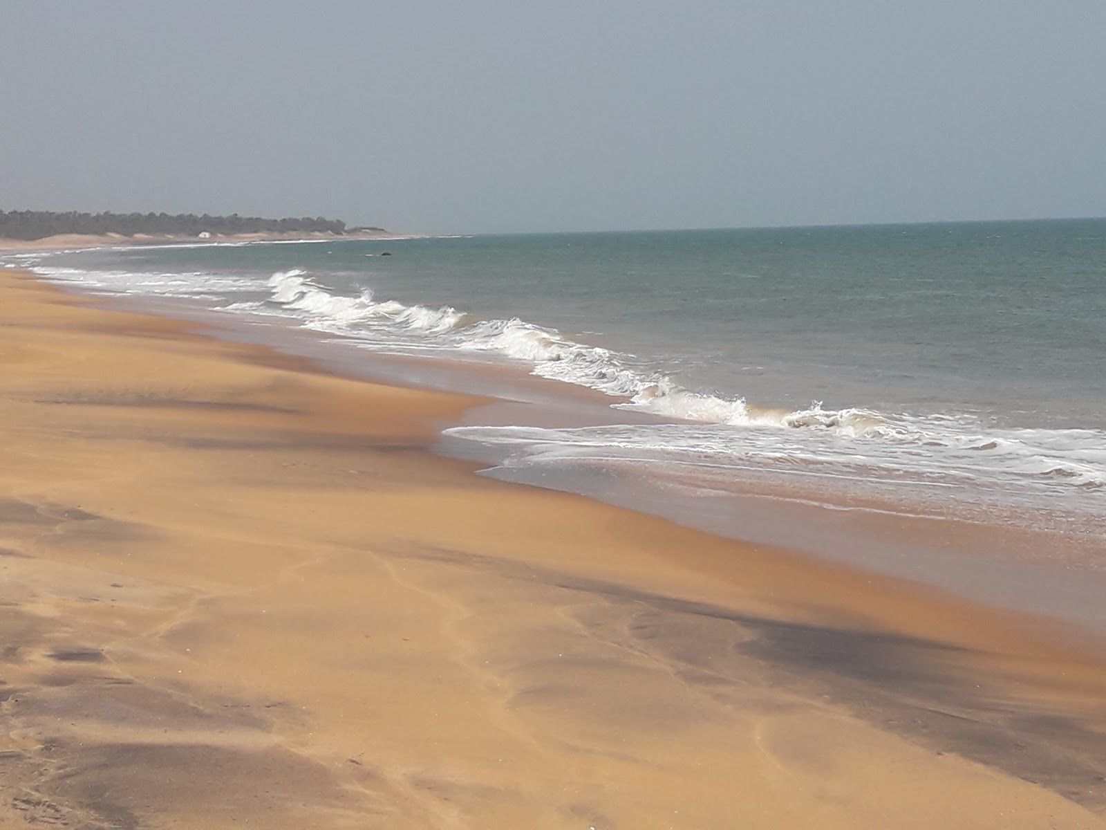 Kancheru Beach的照片 带有碧绿色纯水表面