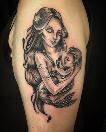 Explore dog tags tattoo ideas, creative tattoo ideas in Ilion, available at Karma ink tattoo & art studio