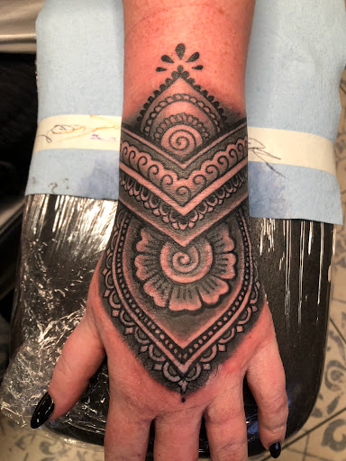 Explore shooting star tattoo ideas, creative tattoo ideas in Jacksonville, available at Electric Legacy Tattoo