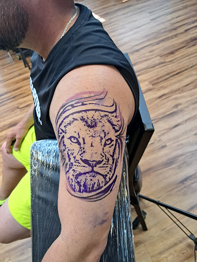 Explore mens tricep tattoo ideas, creative tattoo ideas in Temple, available at Highly Authentic Tattoo