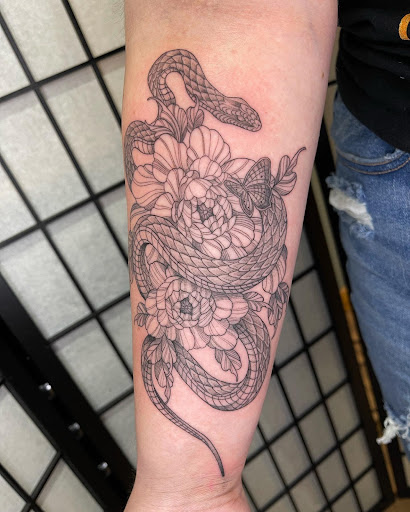 Explore water lily tattoo ideas, creative tattoo ideas in Kenosha, available at Kenosha Tattoo Company