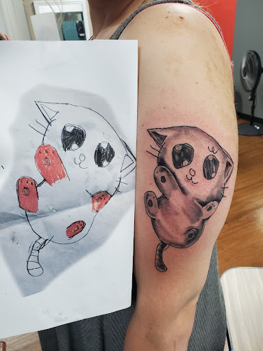 Explore tattoo ideas for athletes, creative tattoo ideas in Rogers, available at Saved by Grace Tattoo Studio