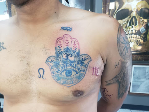 Explore orchid tattoo ideas, creative tattoo ideas in Houston, available at 333 Tattoo Studio HTX