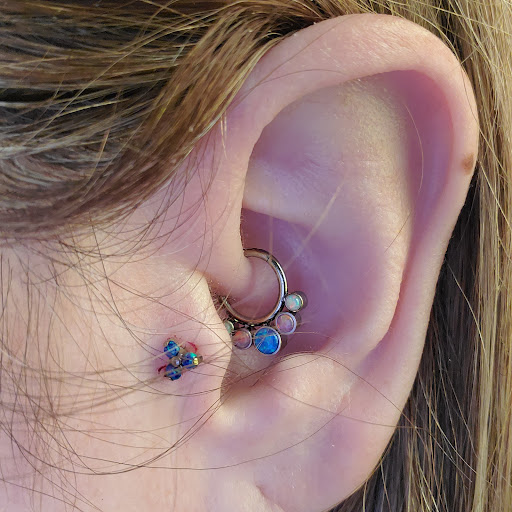 Explore michigan wolverines tattoo ideas, creative tattoo ideas in Chesapeake, available at Finders Keepers Body Piercing