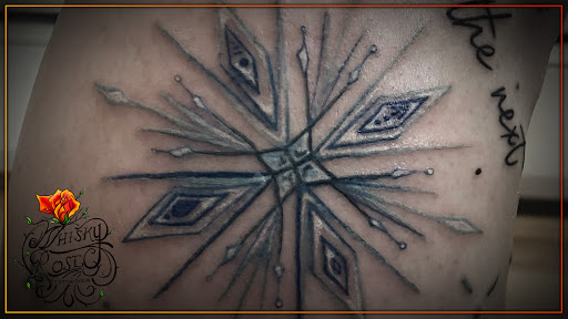 Explore rib tattoo ideas men, creative tattoo ideas in Minocqua, available at Whisky Rose Tattoo Parlor