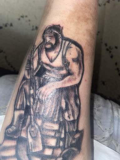 Explore skier tattoo ideas, creative tattoo ideas in San Antonio, available at Master Minds Tattoo