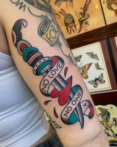 Explore mens tattoo cover up ideas, creative tattoo ideas in Wappingers Falls, available at Graceland Tattoo