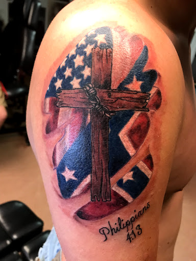 Explore butterfly back tattoo ideas, creative tattoo ideas in Little Rock, available at Catfish Jimmys Tattoo Shop