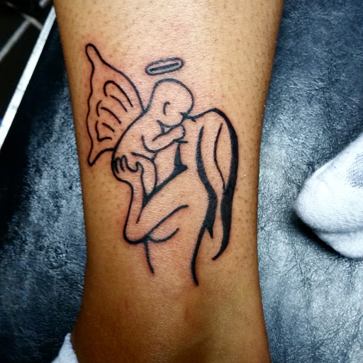 Explore 90's cartoon tattoo ideas, creative tattoo ideas in Erie, available at EliKingInk