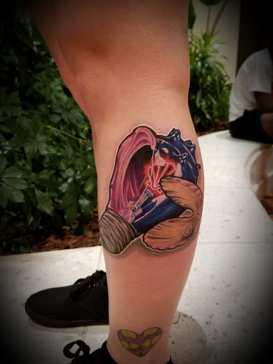 Explore lotus tattoo ideas, creative tattoo ideas in Richmond, available at Inspired Ink